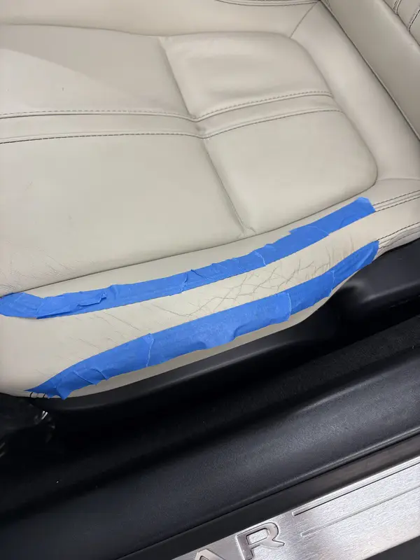 Leather seat bolster before interior repair in Lewis Center, Ohio | Touch It Up Automotive