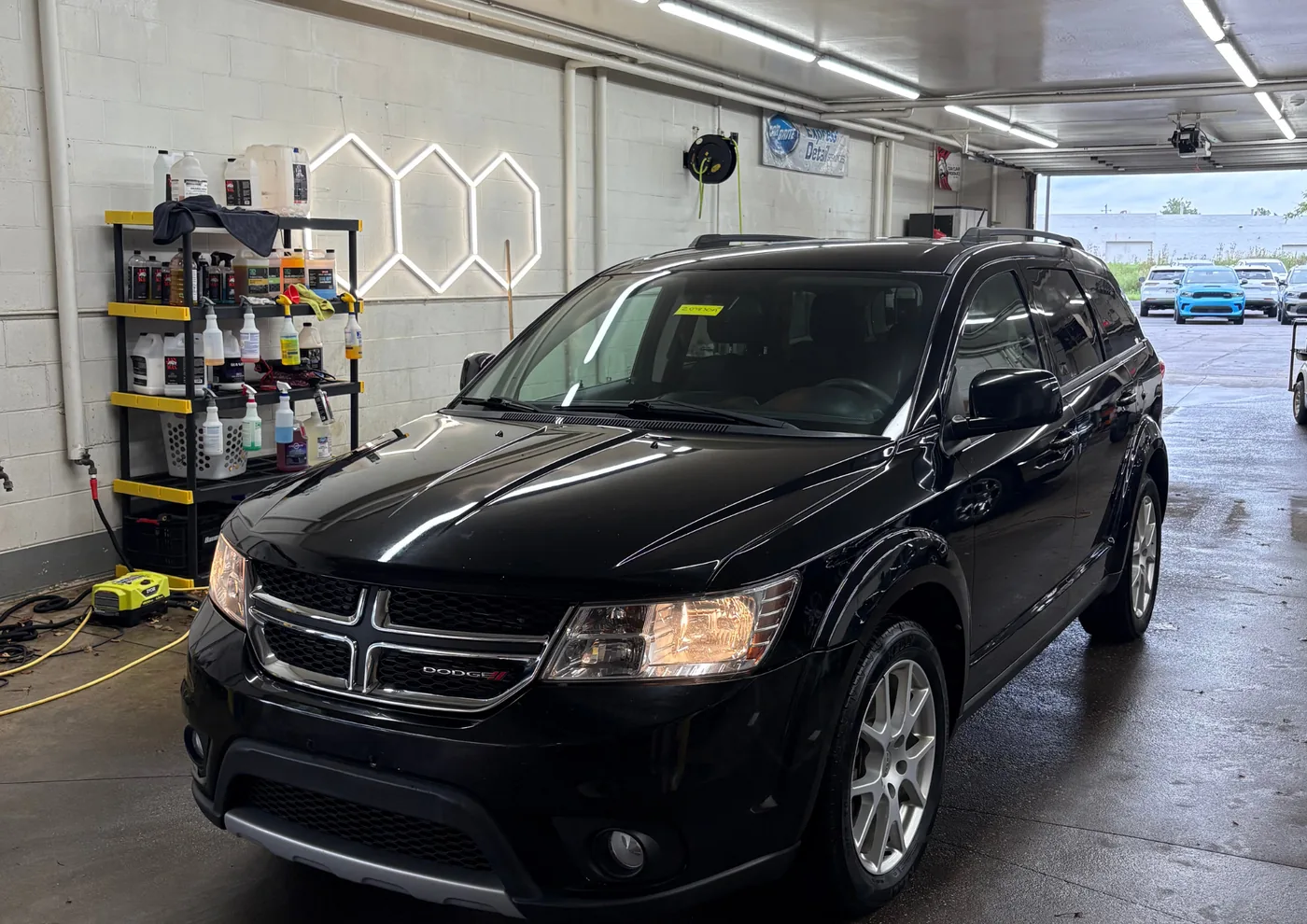 Exterior detail — black Dodge Journey SUV with restored gloss finish — Westerville, Ohio | Touch It Up Automotive