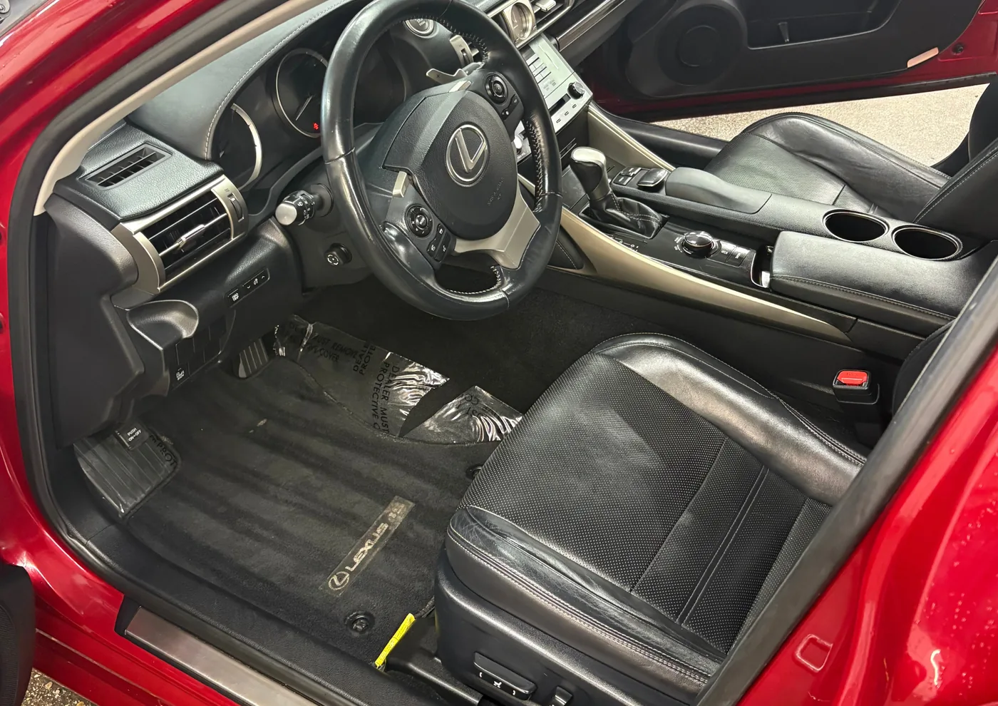 Interior detailing — Lexus IS driver seat, dashboard and carpet after a full deep clean — Hilliard, Ohio | Touch It Up Automotive
