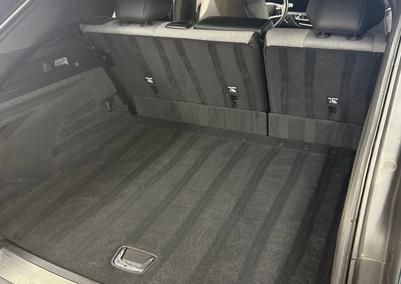 Interior detailing — freshly vacuumed SUV cargo area and rear seat backs — Dublin, Ohio | Touch It Up Automotive