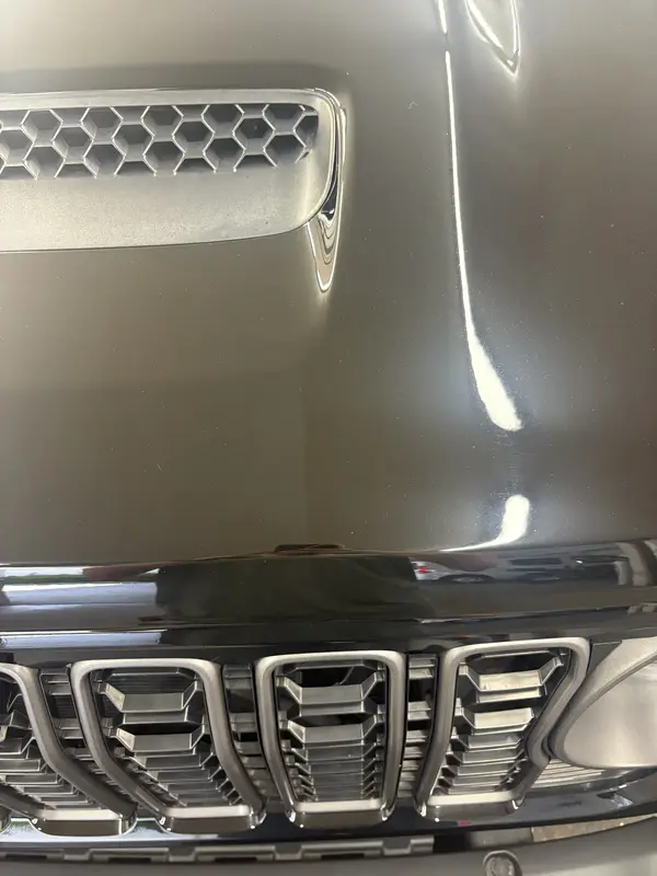 Close-up of glossy hood after machine polish service — Powell, Ohio | Touch It Up Automotive