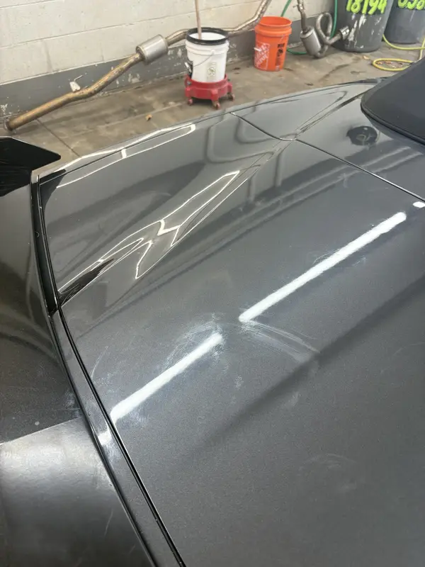 3-Step machine polish before on dark gray paint with visible swirl marks — Powell, Ohio | Touch It Up Automotive