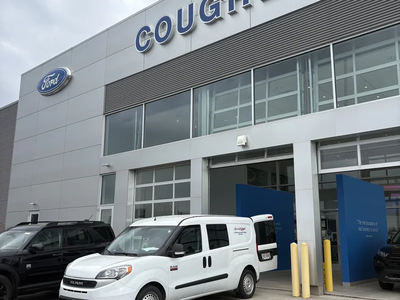 Touch It Up Automotive RAM ProMaster van at a Ford dealership — mobile reconditioning Columbus Ohio