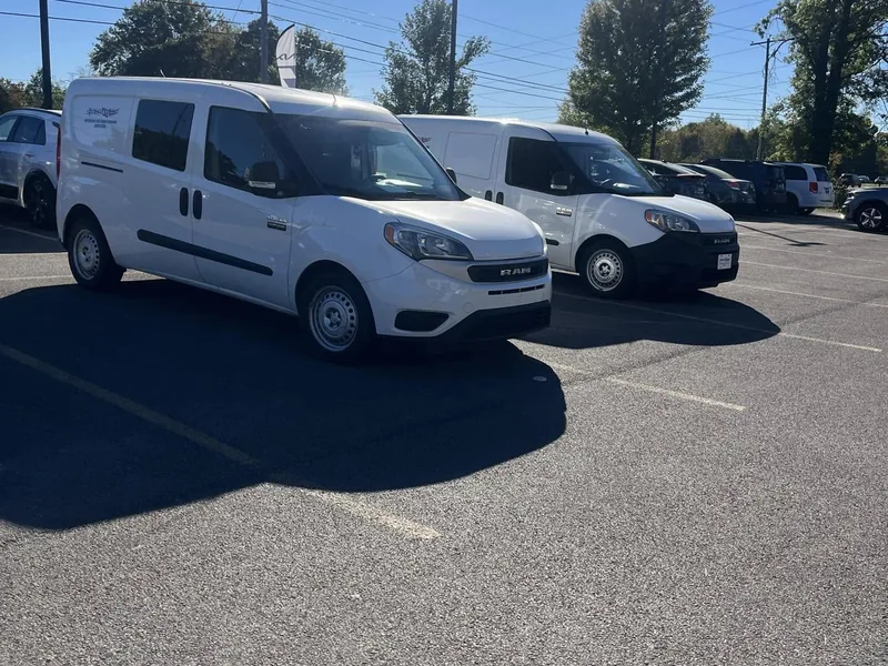 Touch It Up Automotive branded vans at Columbus dealership — serving Central Ohio since 2004 | Touch It Up